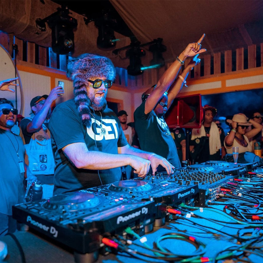 Professional DJs using GORPANIX covers on Pioneer DJ gear during a live performance, showcasing real-world durability and protection.